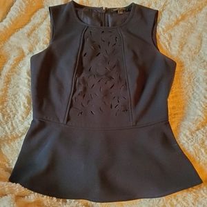 Laser Cut Sleeveless Peplum Top